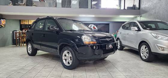 HYUNDAI TUCSON 2.0 MPFI GLS 16V 143CV 2WD GASOLINA 4P AUTOMÁTICO HYUNDAI TUCSON 2.0 MPFI GLS 16V 143CV 2WD GASOLINA 4P AUTOMÁTICO